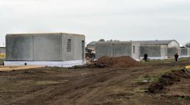 На 5 сгоревших участках в Новокурске уже возведены стены домов