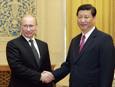 Путин пообещал Си Цзиньпину посетить Китай в мае 2017 года