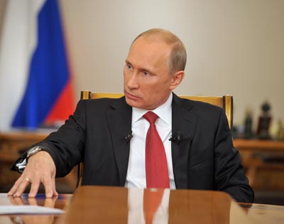 Путин:"Мы справились с олигархией, справимся и с коррупцией"
